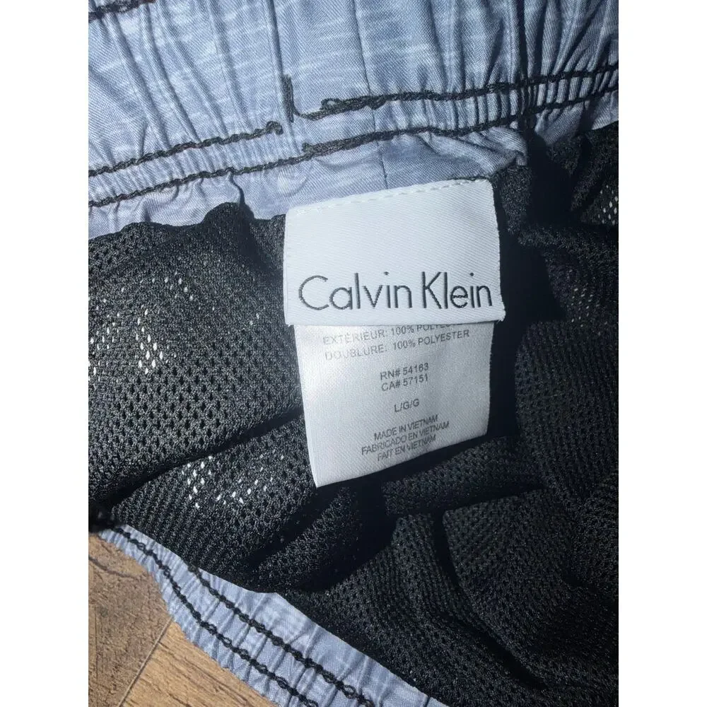 Calvin Klein men’s grey& black swim trunks
